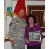 Major General Joseph Anderson with Karen Z. Brass Award