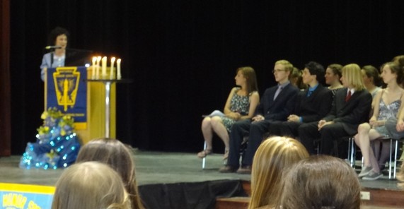 High School National Honors Society Induction speech Brass addressed the National Honors Society at Conifer High School. It was a very well attended event and an honor for Brass. Ms. Elizabeth Milligan was the sponsoring teacher and The Mizel Museum sponsored the event. Brass was seated next to Principal Musiak and Asst. Principal Shapiro. David Zauder, Brass' father, was in attendance and was met by many adoring students who have heard his story of survival and success through his daughter's teachings about being a Standupster. It truly was a joyous celebration, especially for those who graduated with honors through the National Honors Society.